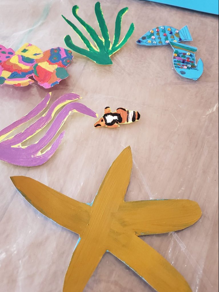Cardboard cut-outs of sea creatures